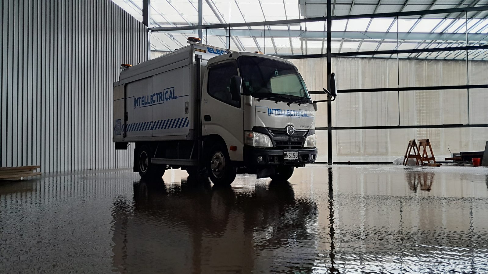 Intellectrical service truck parked inside an industrial shed in the Bay of Plenty
